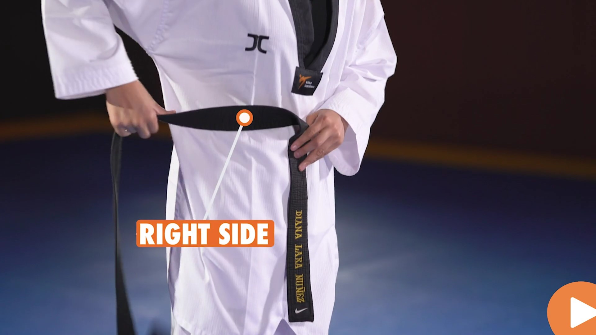 Tying a taekwondo outlet belt